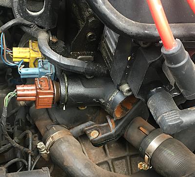 vw passat thermostat replacement